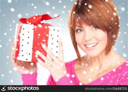 bright picture of happy woman with gift box .