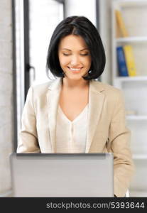 bright picture of happy woman with laptop computer