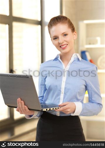 bright picture of happy woman with laptop computer