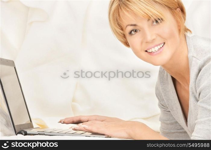 bright picture of happy woman with laptop computer&#xA;