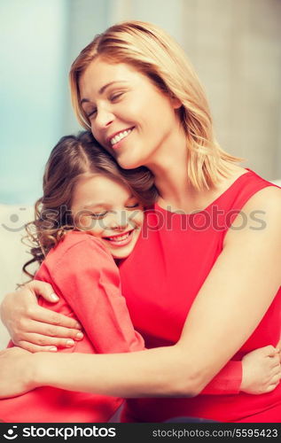 bright picture of hugging mother and daughter