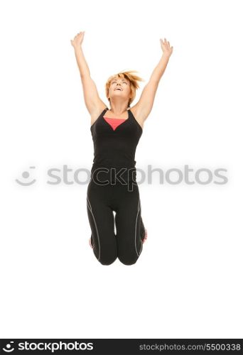 bright picture of jumping fitness instructor over white&#xA;
