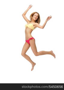 bright picture of jumping woman in bikini