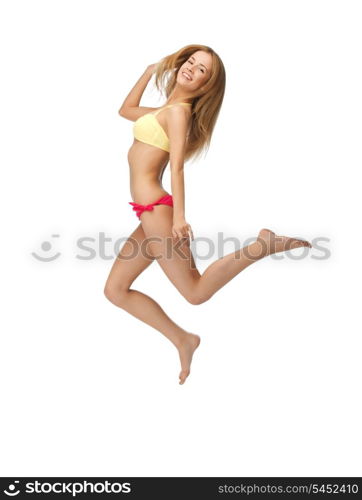 bright picture of jumping woman in bikini