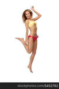 bright picture of jumping woman in bikini