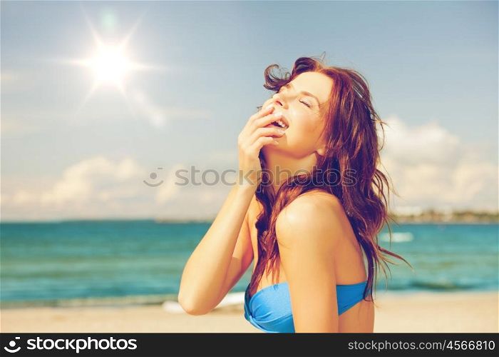 bright picture of laughing woman on the beach.. laughing woman on the beach