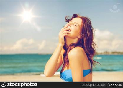 bright picture of laughing woman on the beach.. laughing woman on the beach