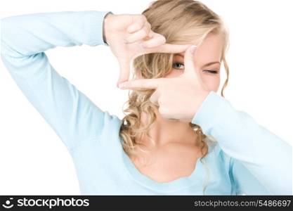 bright picture of lovely blonde creating a frame with fingers