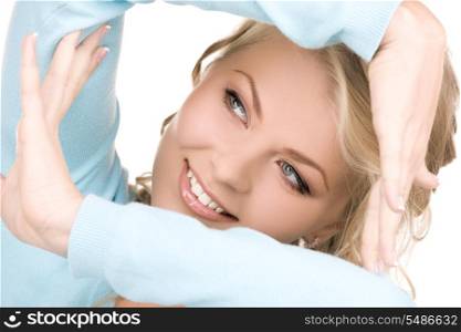 bright picture of lovely blonde creating a frame with hands