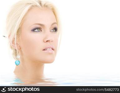 bright picture of lovely blonde in water