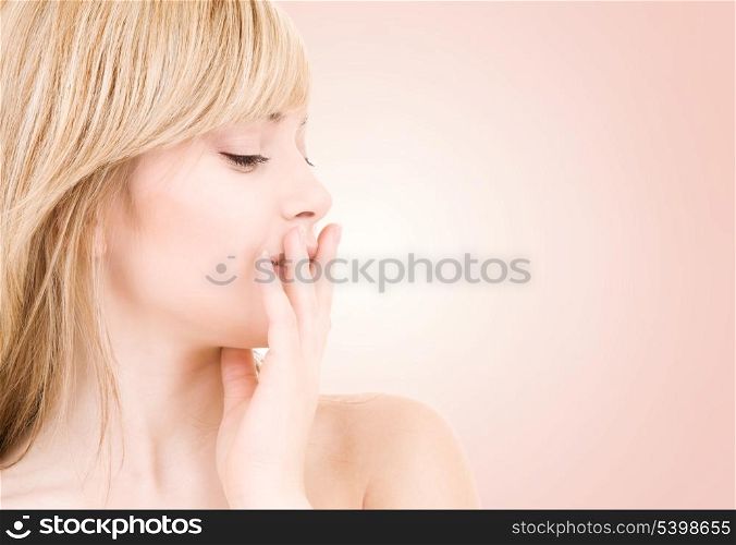 bright picture of lovely blonde over beige background