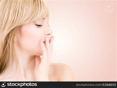 bright picture of lovely blonde over beige background