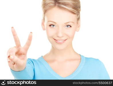 bright picture of lovely blonde showing victory sign