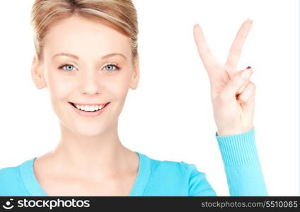 bright picture of lovely blonde showing victory sign