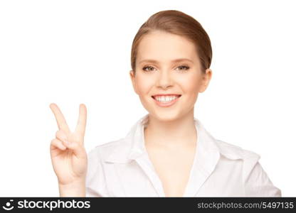 bright picture of lovely blonde showing victory sign&#xA;