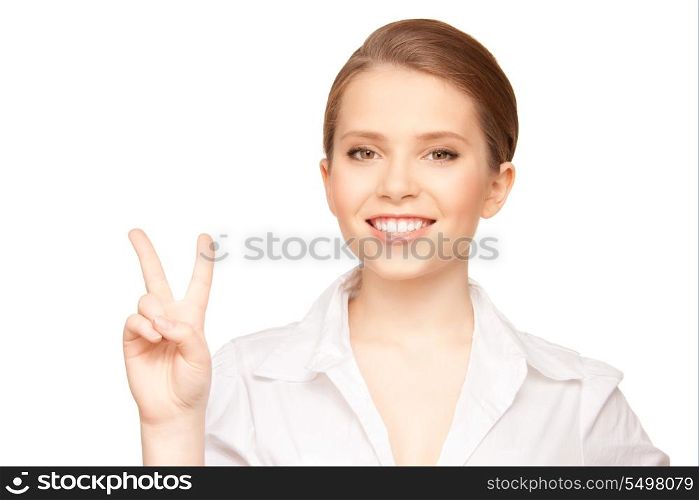bright picture of lovely blonde showing victory sign&#xA;