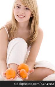 bright picture of lovely blonde with oranges