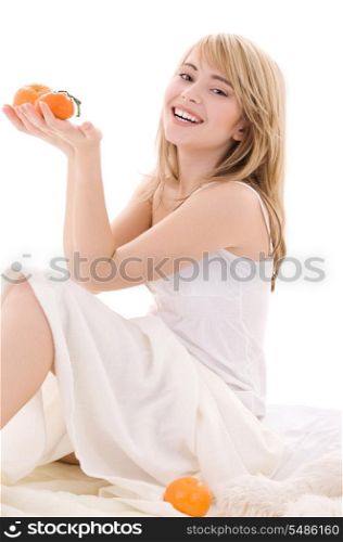 bright picture of lovely blonde with oranges