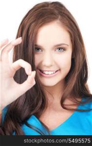 bright picture of lovely girl showing ok sign