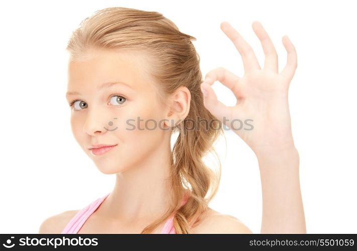 bright picture of lovely girl showing ok sign