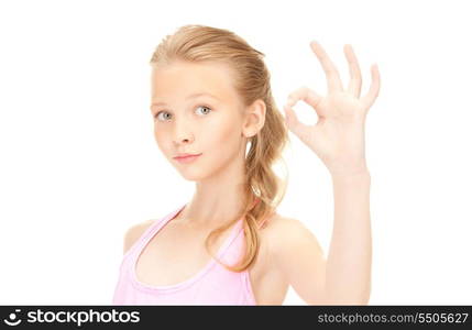 bright picture of lovely girl showing ok sign