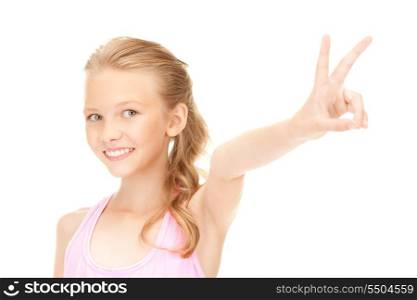 bright picture of lovely girl showing victory sign