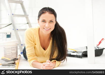 bright picture of lovely housewife making repairing works