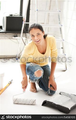 bright picture of lovely housewife painting at home