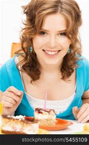 bright picture of lovely housewife with cake and candle
