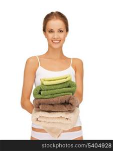 bright picture of lovely housewife with colorful towels.