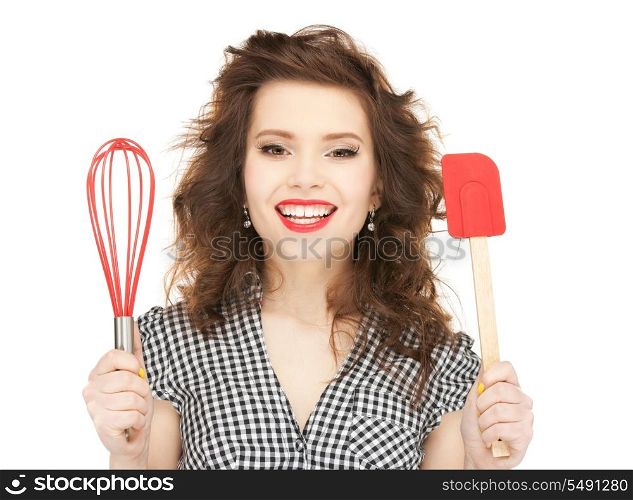 bright picture of lovely housewife with cooking eqipment.