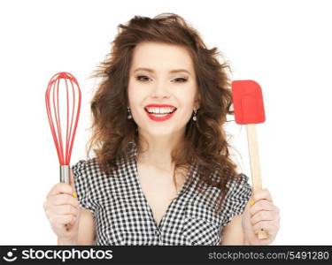 bright picture of lovely housewife with cooking eqipment.