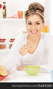 bright picture of lovely housewife with cup of muesli