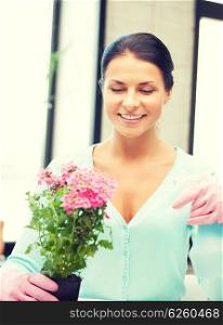 bright picture of lovely housewife with flower.. lovely housewife with flower