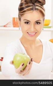 bright picture of lovely housewife with green apple