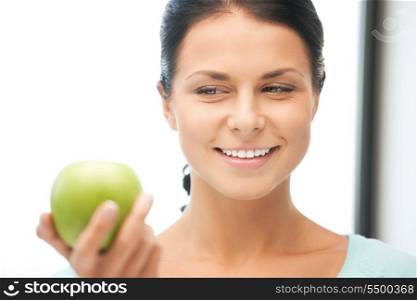 bright picture of lovely housewife with green apple