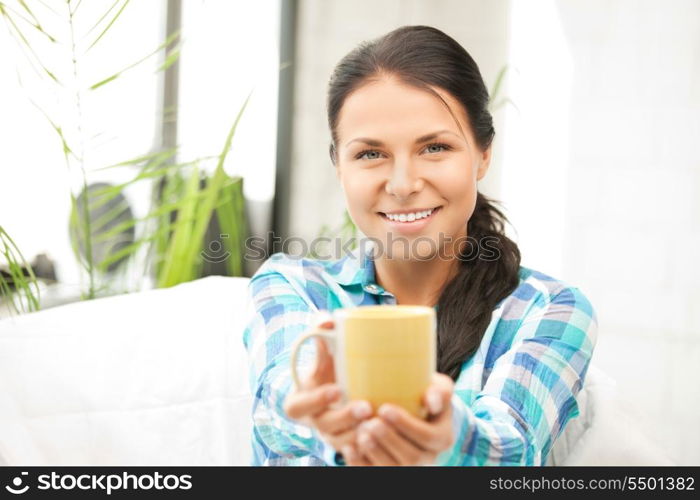 bright picture of lovely housewife with mug