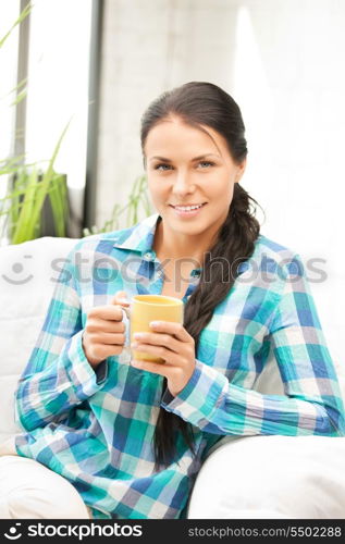 bright picture of lovely housewife with mug