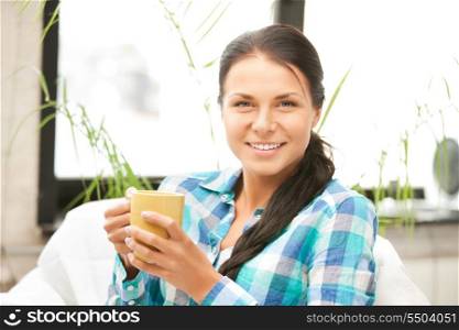 bright picture of lovely housewife with mug