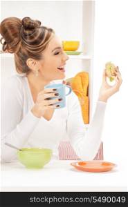 bright picture of lovely housewife with sandwich