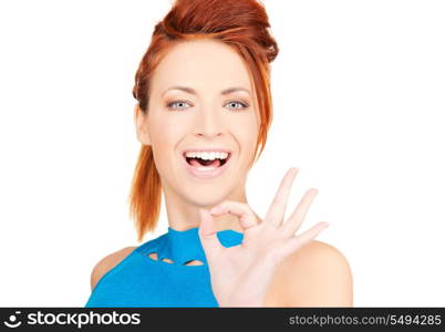 bright picture of lovely redhead showing ok sign