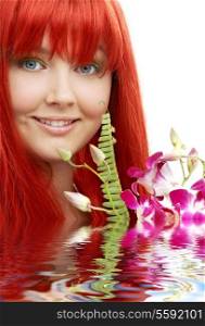 bright picture of lovely redhead with orchid in water