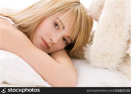 bright picture of lovely teenage girl in bed