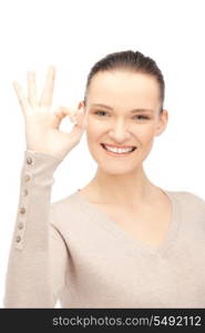 bright picture of lovely teenage girl showing ok sign