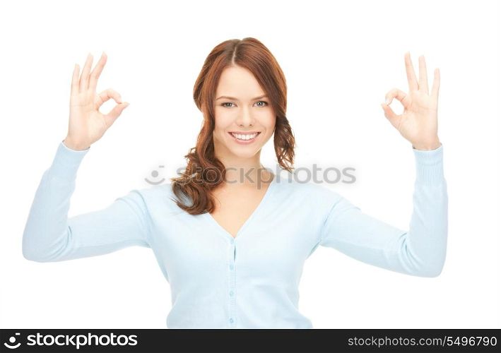 bright picture of lovely teenage girl showing ok sign