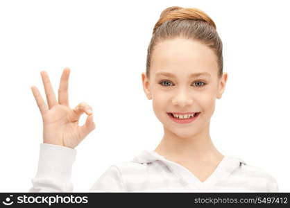 bright picture of lovely teenage girl showing ok sign