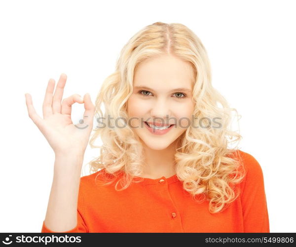 bright picture of lovely teenage girl showing ok sign