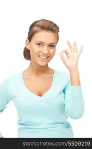 bright picture of lovely teenage girl showing ok sign