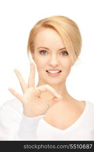 bright picture of lovely teenage girl showing ok sign