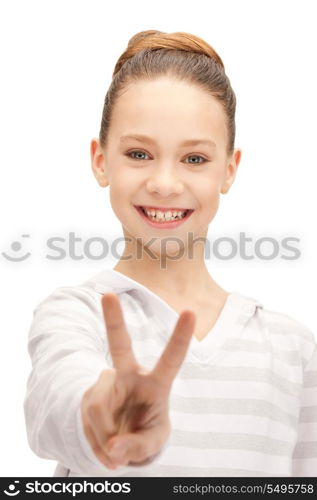 bright picture of lovely teenage girl showing victory sign